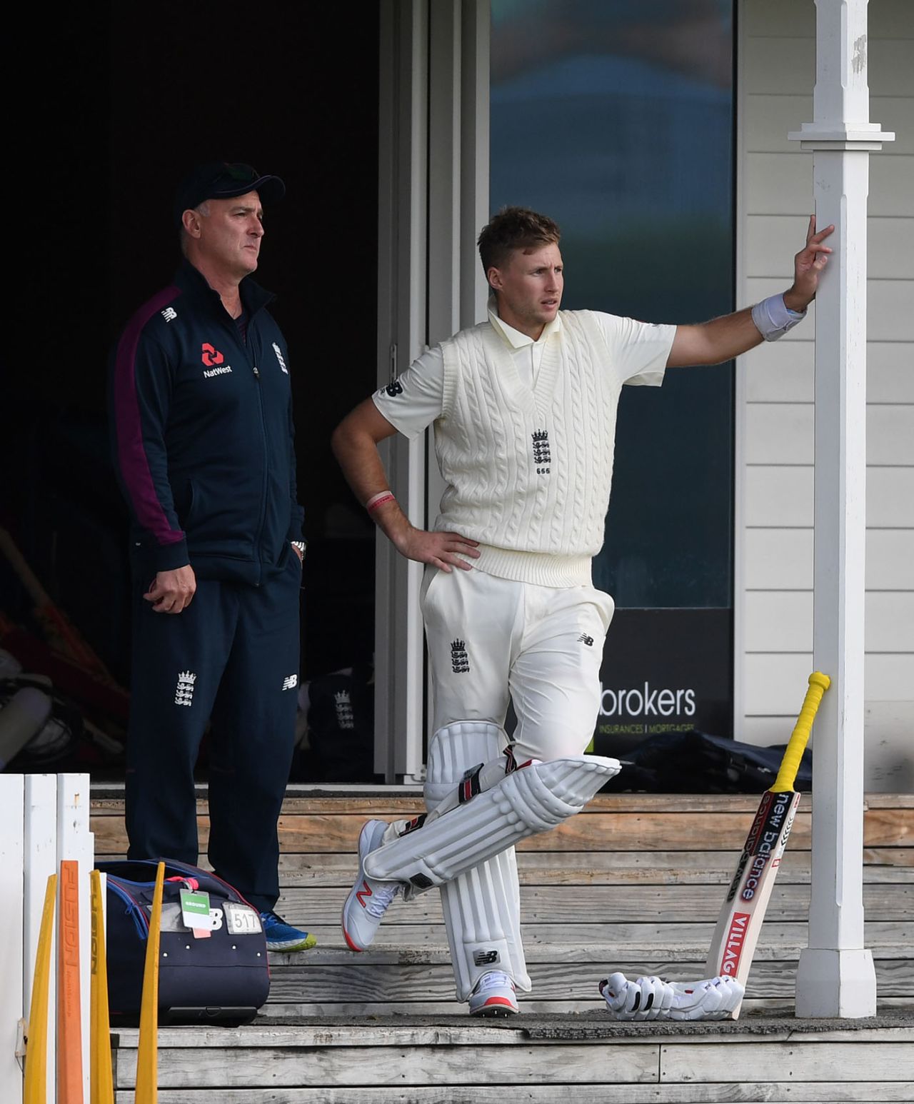 England captain Joe Root watches play alongside batting coach Graham Thorpe during the tour match between New Zealand XI and England in Whangarei, November 12, 2019