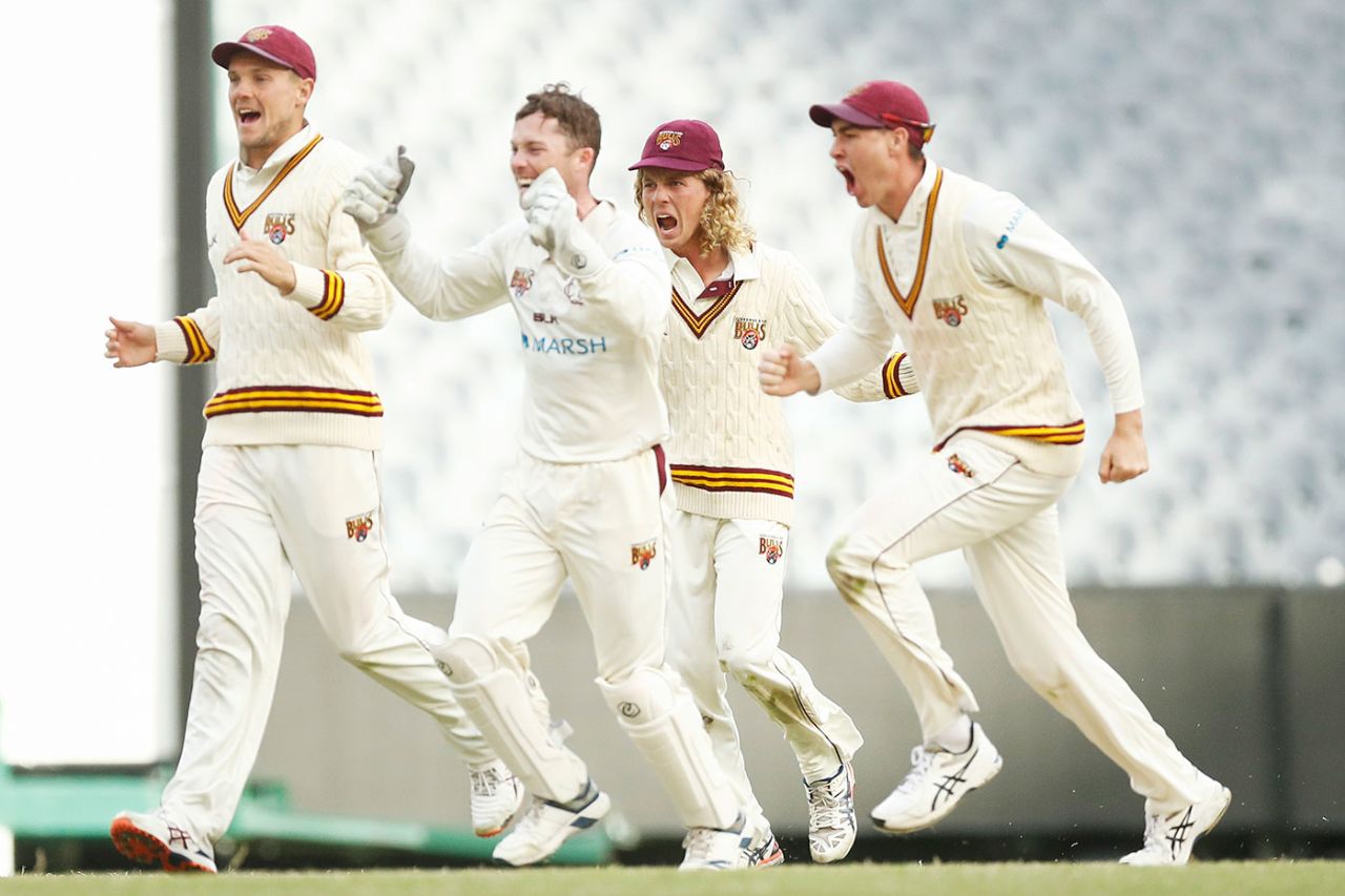 The Queensland players celebrate their win, Victoria v Queensland, Sheffield Shield 2019-20, 4th day, Melbourne, November 15, 2019