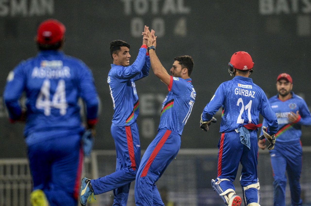 Mujeeb ur Rehman celebrates a wicket with Naveen-ul-Haq, Afghanistan v West Indies, 1st T20I, Lucknow, November 14, 2019