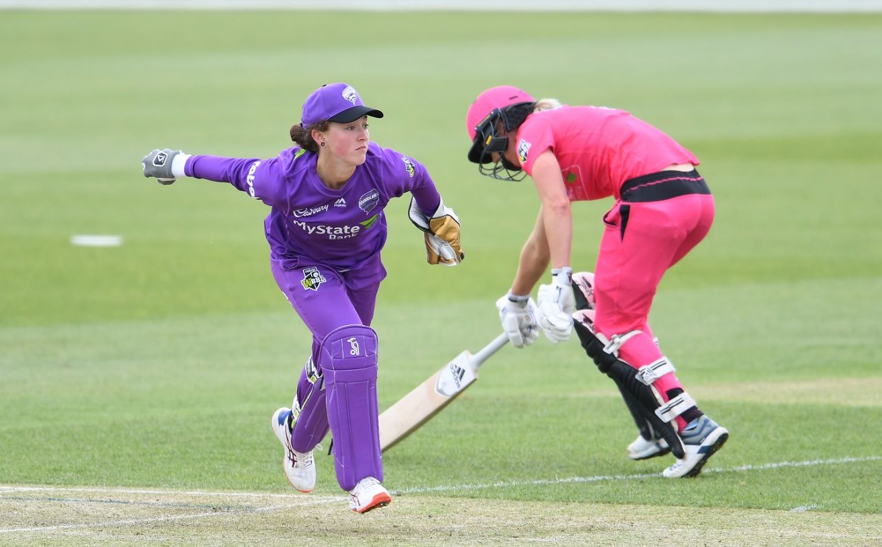 Wicketkeeper Emily Smith in action