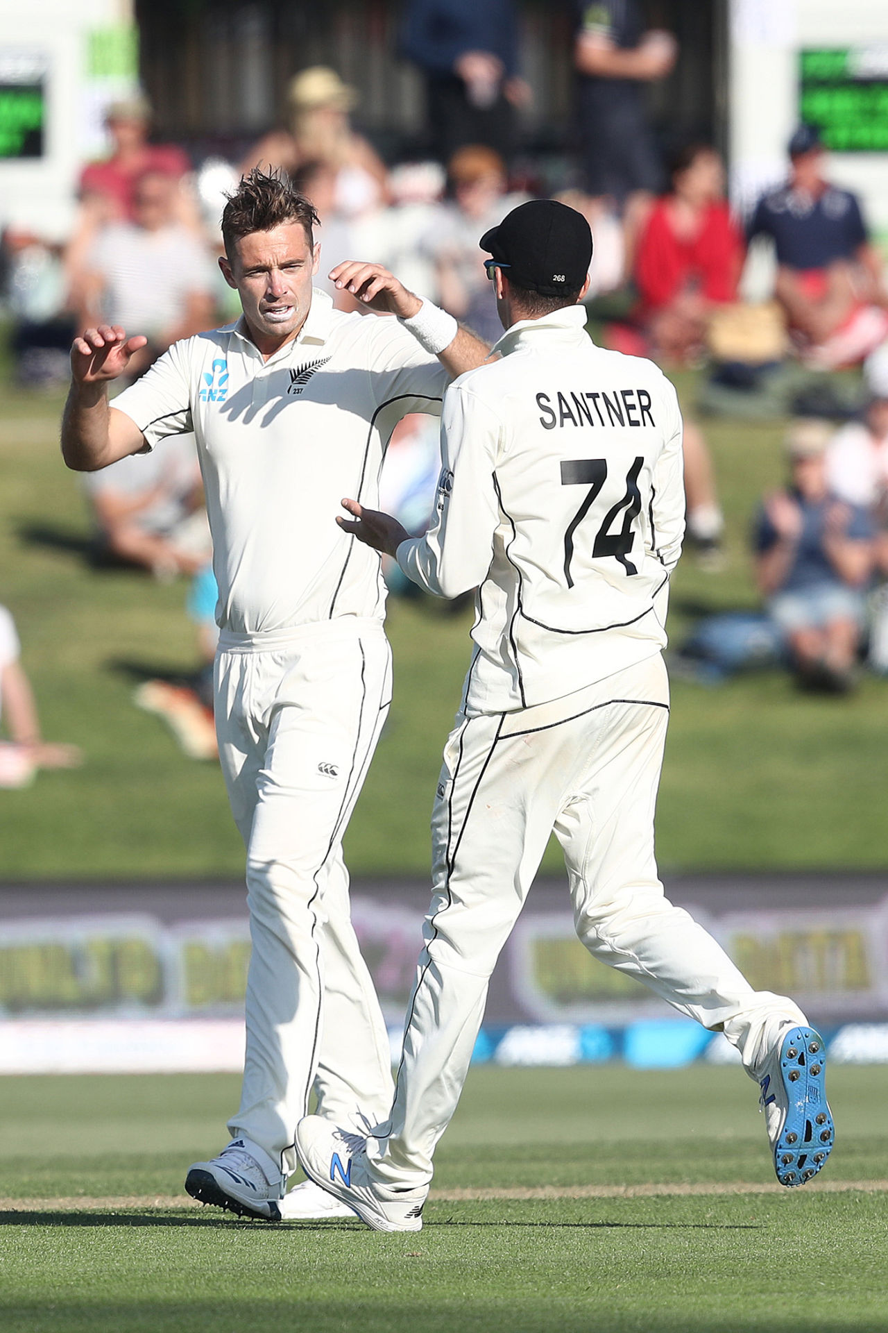 Tim Southee gets a high five from Mitchell Santner, New Zealand v England, 1st Test, Mount Maunganui, 1st day, November 21, 2019