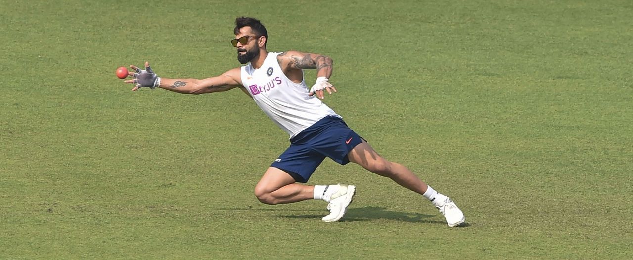 Virat Kohli gets a feel of the pink ball during a fielding session, Kolkata, November 21, 2019