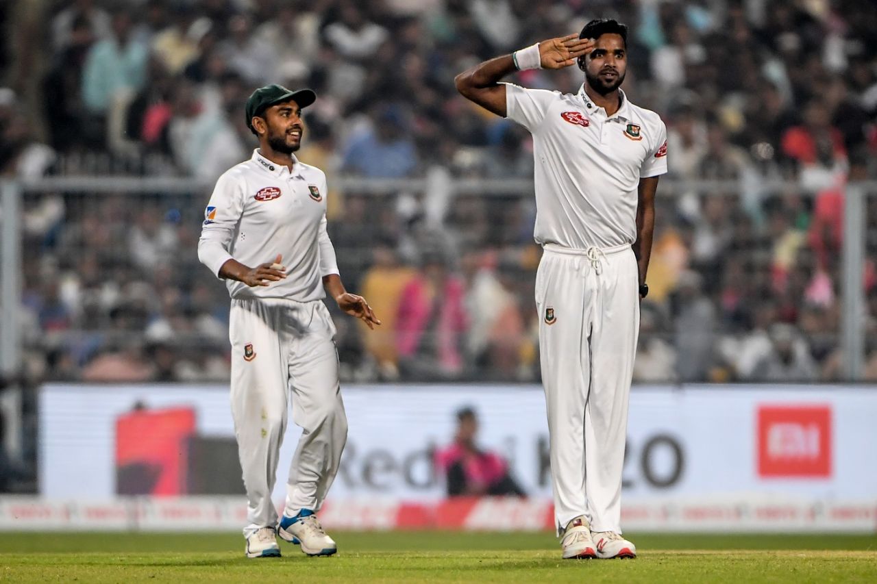 Ebadot Hossain brings out the salute while Mehidy Hasan looks on, India v Bangladesh, 2nd Test, 1st day, Kolkata, November 22, 2019