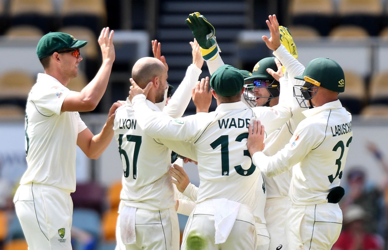 Nathan Lyon celebrates with his teammates after dismissing Babar Azam, Australia v Pakistan, 1st Test, Brisbane, November 24, 2019