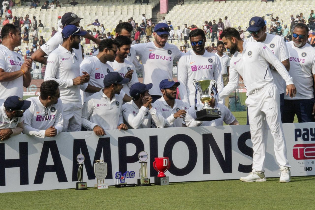 Virat Kohli hands over the trophy to KS Bharat, India v Bangladesh, 2nd Test, Kolkata, 2nd day, November 23, 2019