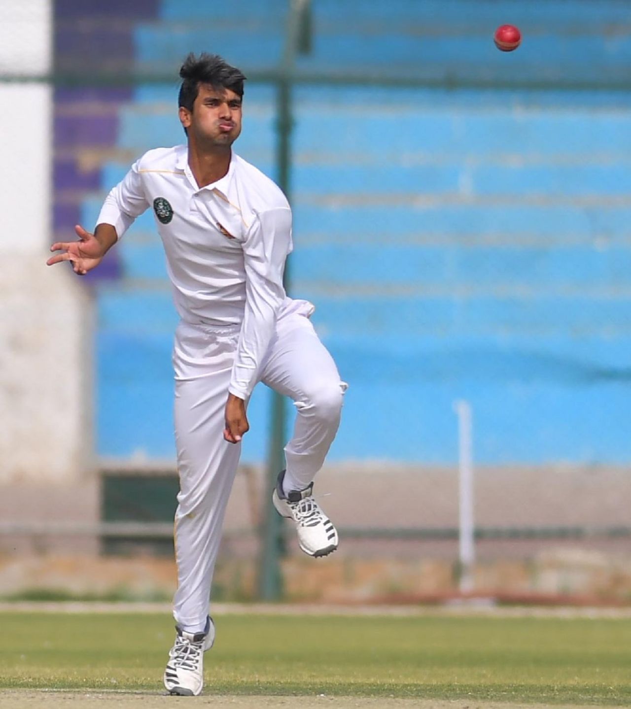 Hassan Khan loops one up, QeA Trophy 2019