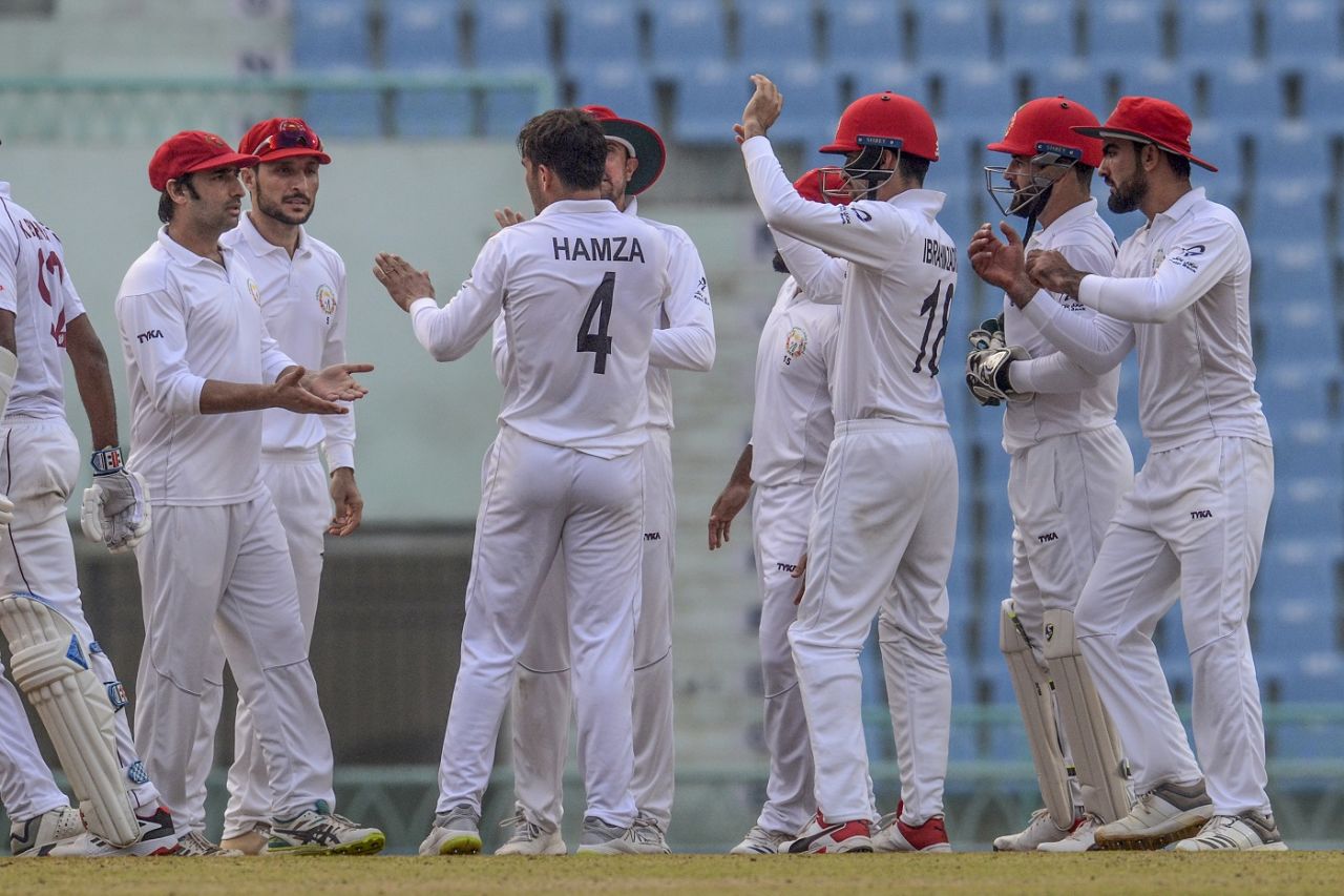 Amir Hamza is congratulated for a wicket, Afghanistan v West Indies, Only Test, 1st day, Lucknow, November 27, 2019