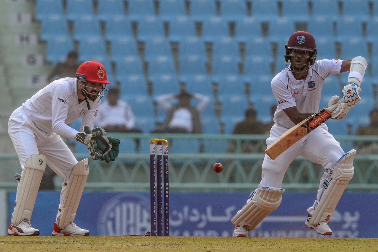 Kraigg Brathwaite plays one on the off side as Afsar Zazai looks on, Afghanistan v West Indies, only Test, Lucknow, 1st day, November 27, 2019