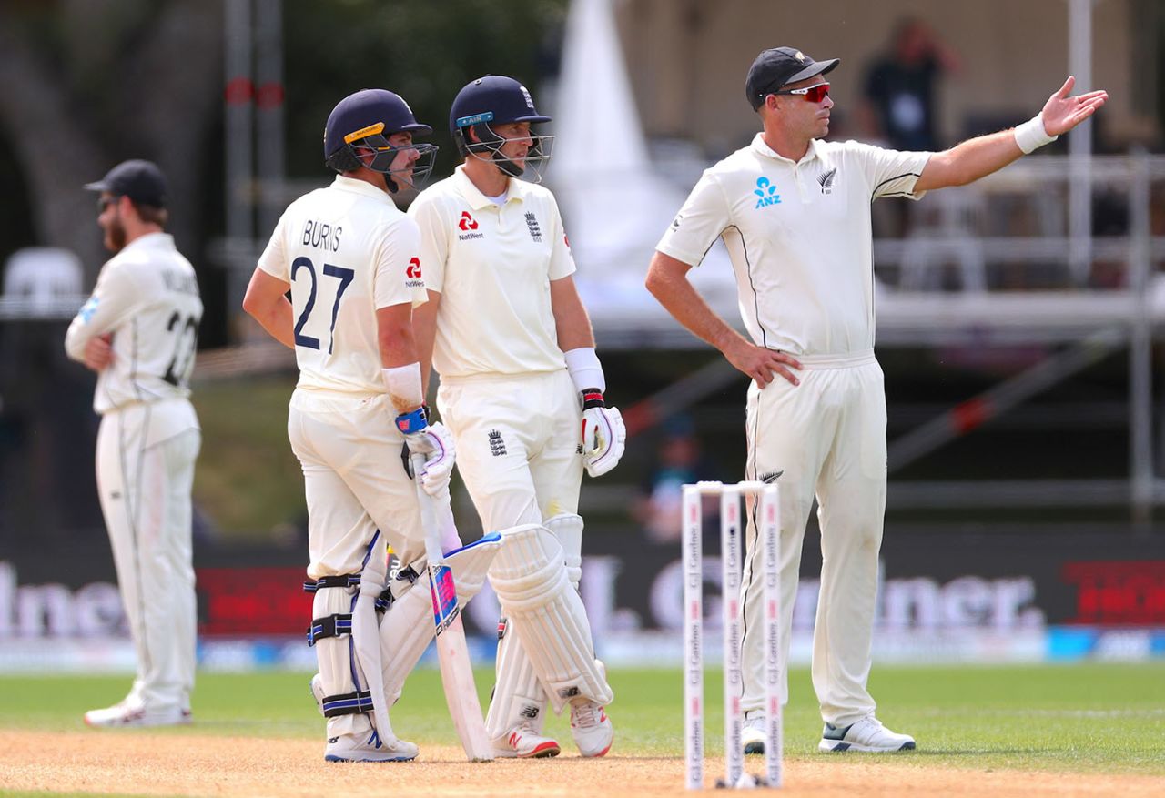 Tim Southee gestures towards the screen displaying Rory Burns' run out as Joe Root looks on, New Zealand v England, 2nd Test, Hamilton, December 1, 2019