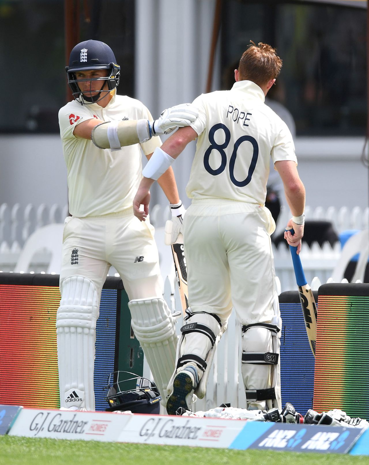 Sam Curran pats teammate Ollie Pope on the back as he goes out to bat, New Zealand v England, 2nd Test, Hamilton, December 02, 2019