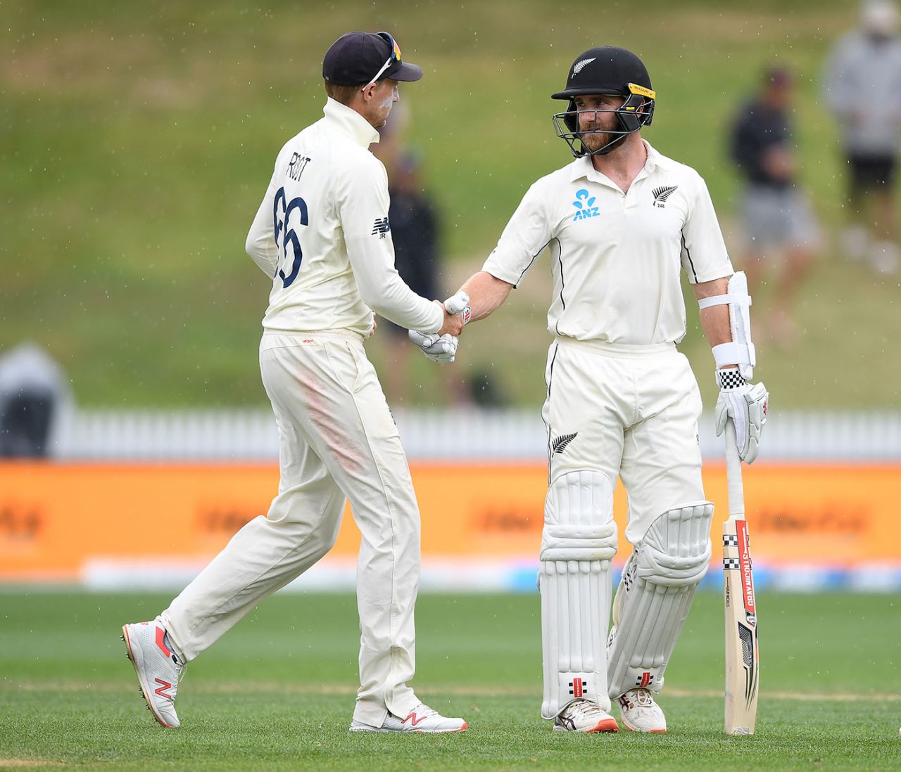 Joe Root shakes hands with Kane Williamson as rain stops play on day 5, New Zealand v England, 2nd Test, Hamilton, December 03, 2019