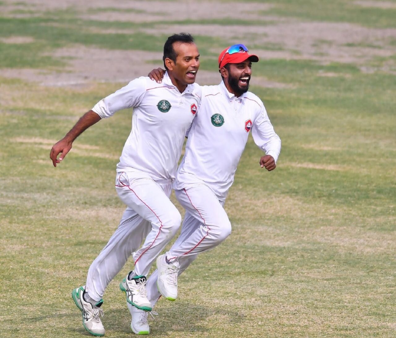 Nauman Ali and Faizan Riaz celebrate their team's sensational win, Northern (Pakistan) v Khyber Pakhtunkhwa, Quaid-e-Azam Trophy 2019-20, Karachi, day 4, December 5, 2019