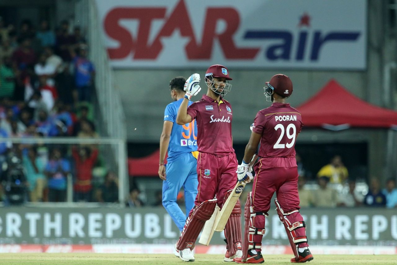 Lendl Simmons and Nicholas Pooran celebrate victory, India v West Indies, 2nd T20I, Thiruvananthapuram, December 8, 2019