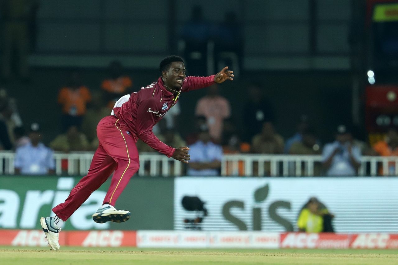 Hayden Walsh completes his action, India v West Indies, 2nd T20I, Thiruvananthapuram, December 8, 2019