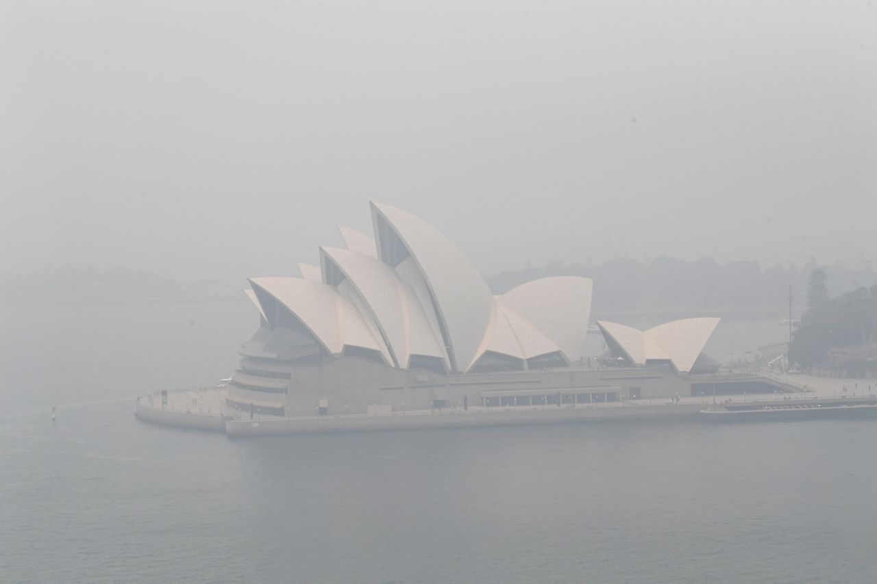 A smoke haze envelops the Sydney Harbour with the Opera House hardly visible, Sydney, December 10, 2019