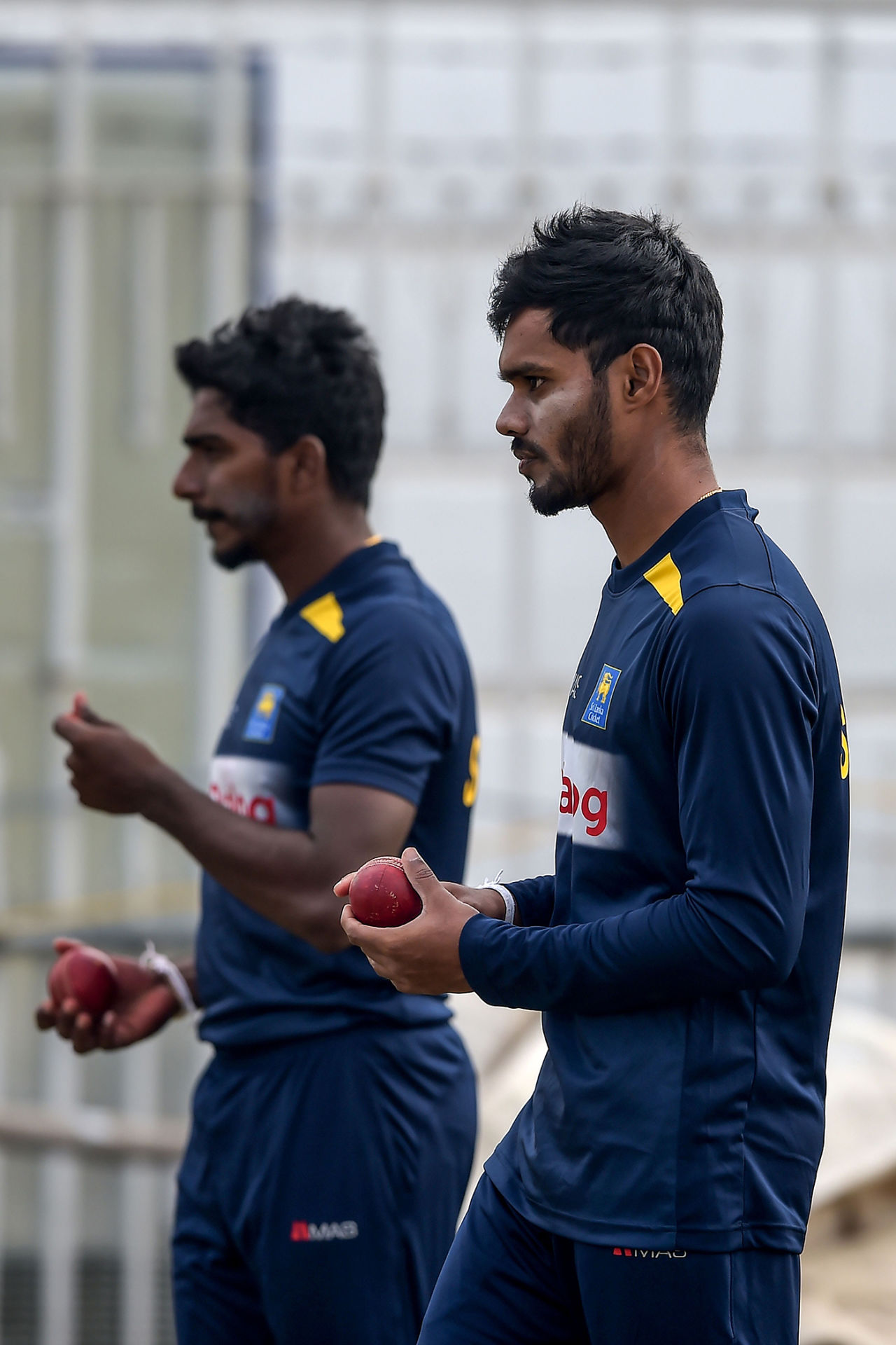 Dhananjaya de Silva and Lakshan Sandakan prepare to bowl at the nets, Rawalpindi, December 10, 2019