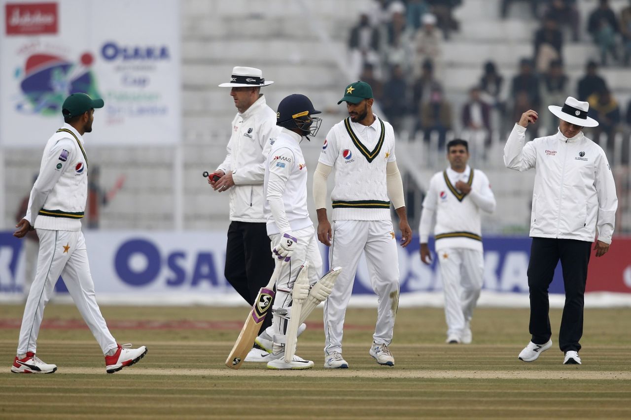The umpires bring a session to a premature close, Pakistan v Sri Lanka, 1st Test, Rawalpindi, Day 3