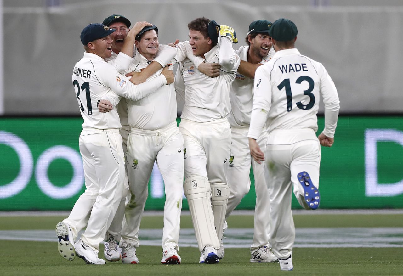 Steven Smith is mobbed by his teammates after taking a stunning catch, Australia v New Zealand, 1st Test, Perth, 2nd day, December 13, 2019