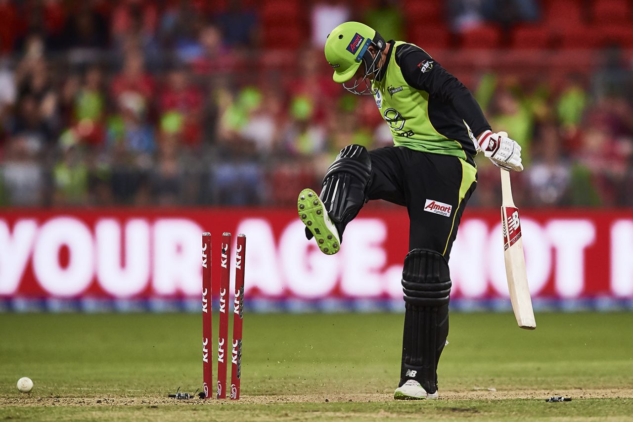Joe Root kicks out in frustration after a low score for Sydney Thunder
