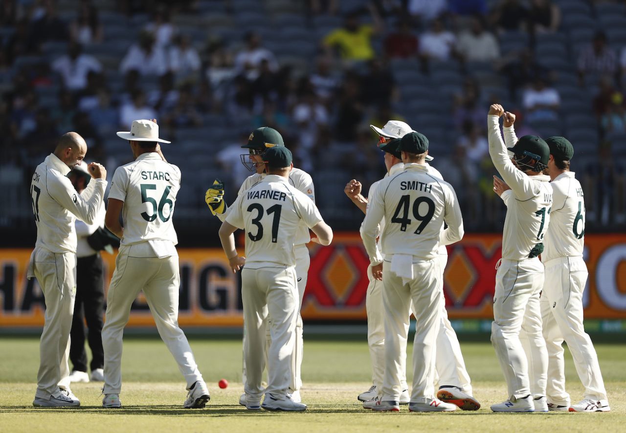 Australia celebrate getting a review right to give Nathan Lyon a wicket, Australia v New Zealand, 1st Test, Perth, 4th day, December 15, 2019