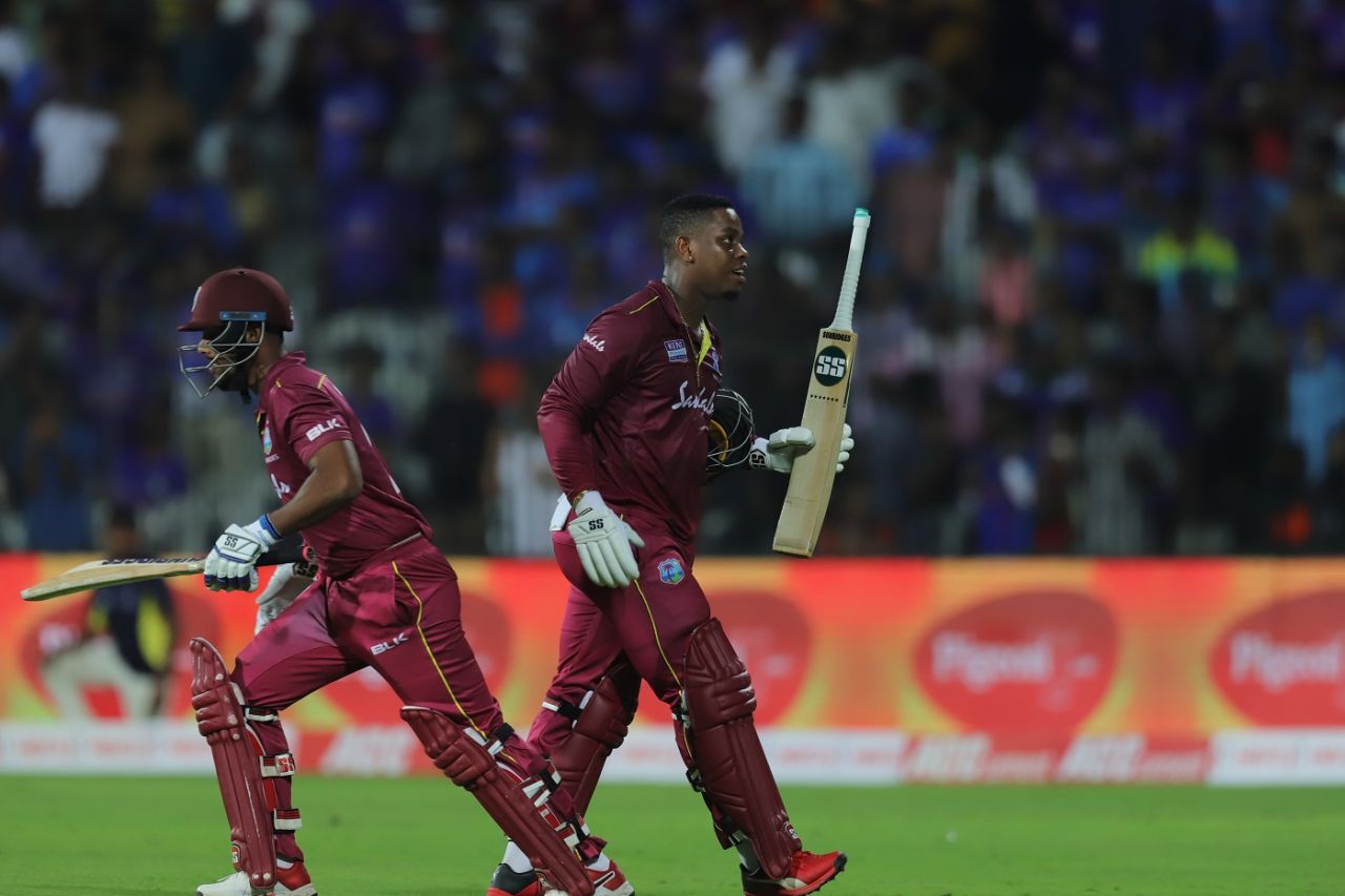 Opposite ways - a lively Hetmyer and a more staid Hope symbolise their 200-plus stand in one image, India v West indies, 1st ODI, Chennai, December 15, 2019