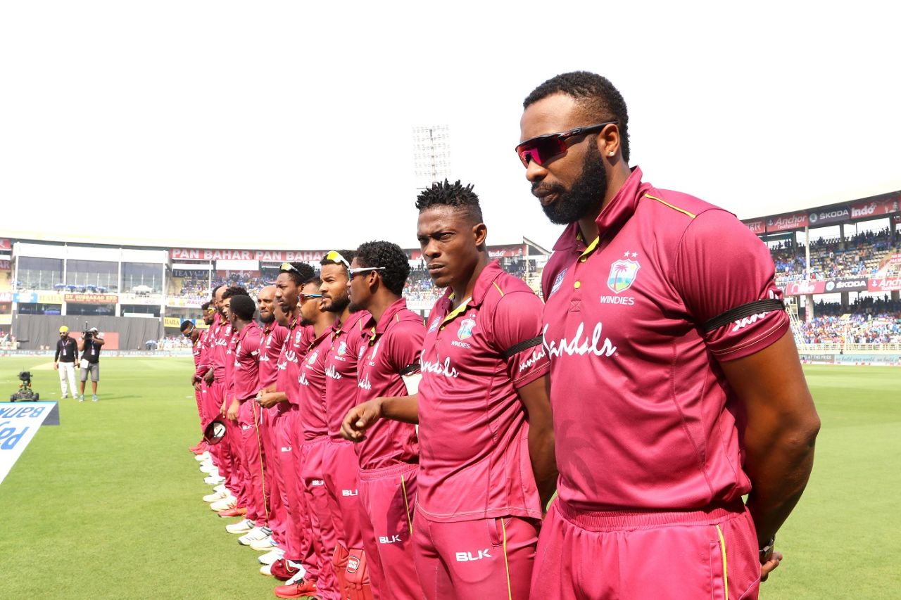 Kieron Pollard stands shoulder to shoulder with his team-mates, India v West Indies, 2nd ODI, Visakhapatnam, December 18, 2019