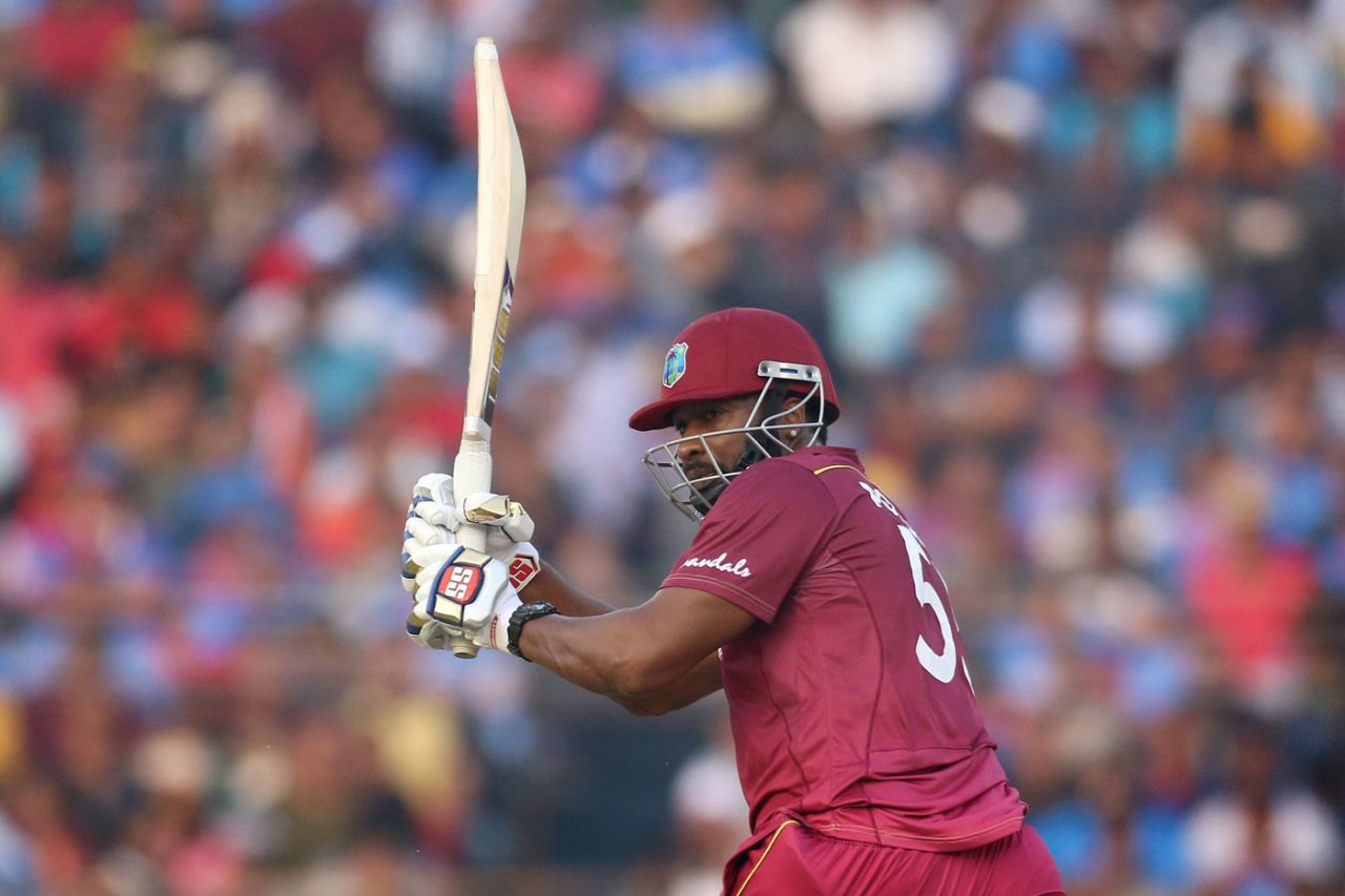 Kieron Pollard whips one into the leg side, India v West Indies, 3rd ODI, Cuttack, December 22, 2019