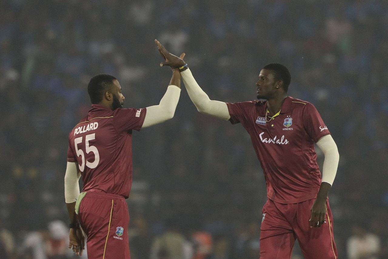 Kieron Pollard and Jason Holder celebrate, India v West Indies, 3rd ODI, Cuttack, December 22, 2019

