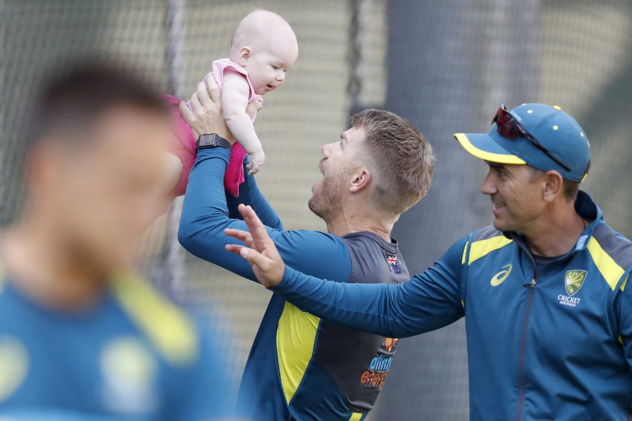 David Warner plays with his baby on the sidelines of the nets, Melbourne, December 25, 2019