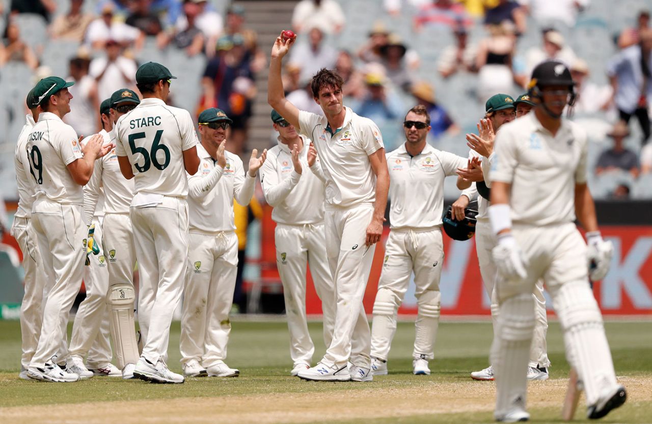 Pat Cummins raises the ball after his fifth wicket, Australia v New Zealand, 2nd Test, Melbourne, 3rd day, December 28, 2019