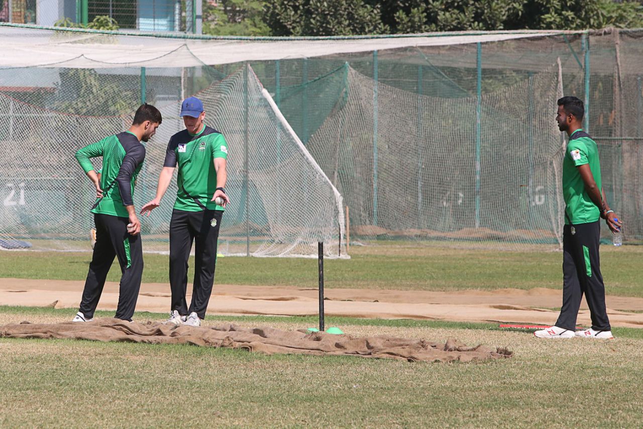Nantie Hayward works with a bowler in the nets