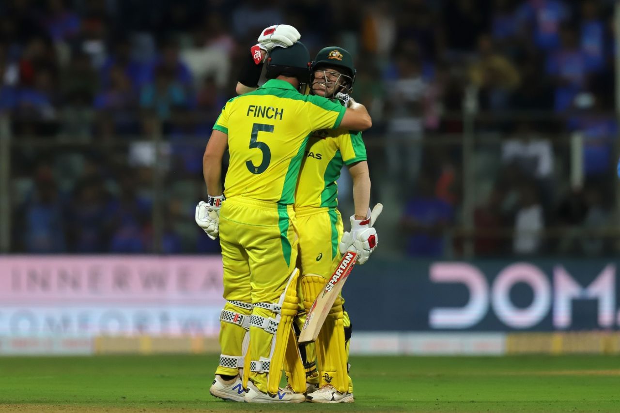 David Warner congratulates Aaron Finch on his hundred, India v Australia, 1st ODI, Mumbai, January 14, 2020