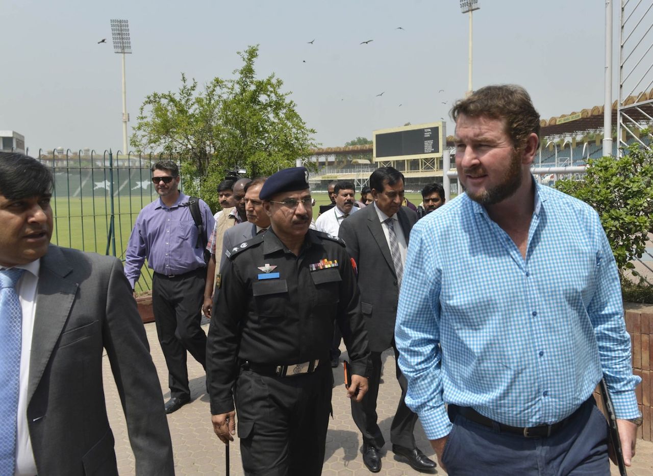 Alistair Campbell, the head of the security delegation from Zimbabwe inspects the Gaddafi Cricket Stadium with Pakistani cricket officials, Lahore, May 6, 2015
