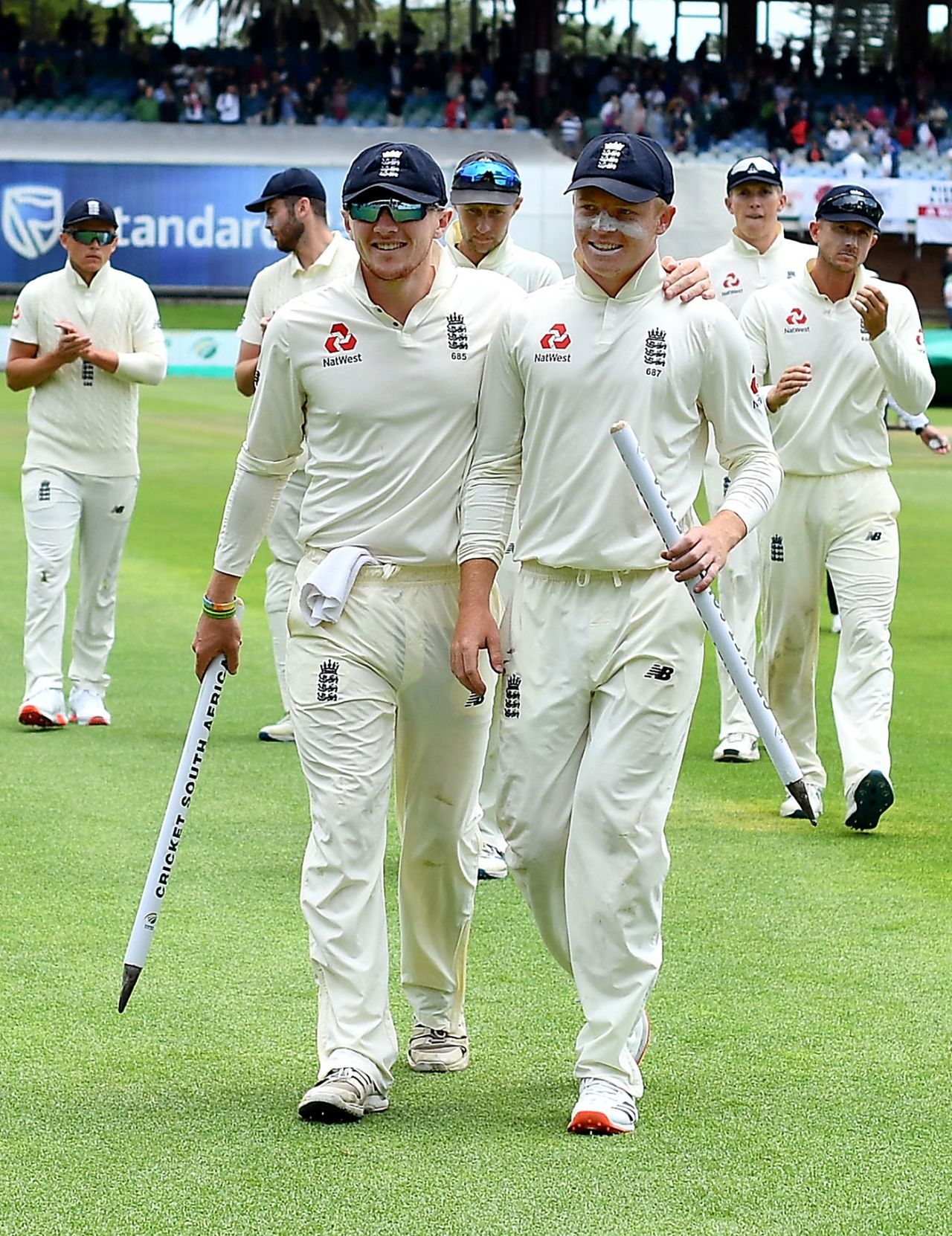 Dom Bess and Ollie Pope celebrate their success, South Africa v England, 3rd Test, 5th day, Port Elizabeth, January 20, 2020 