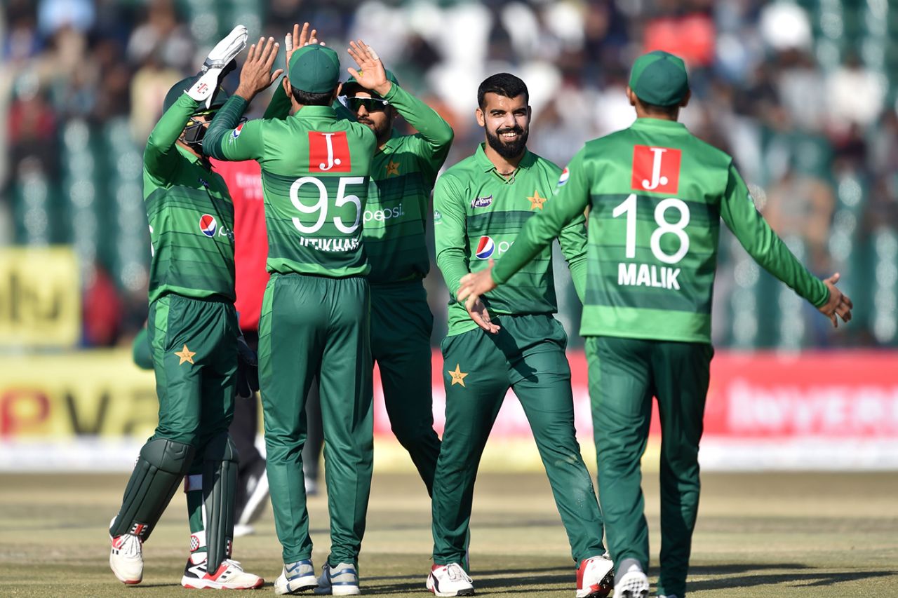 Pakistan gather around Shadab Khan after the dismissal of Tamim Iqbal, Pakistan v Bangladesh, 1st T20I, Lahore, January 23, 2020