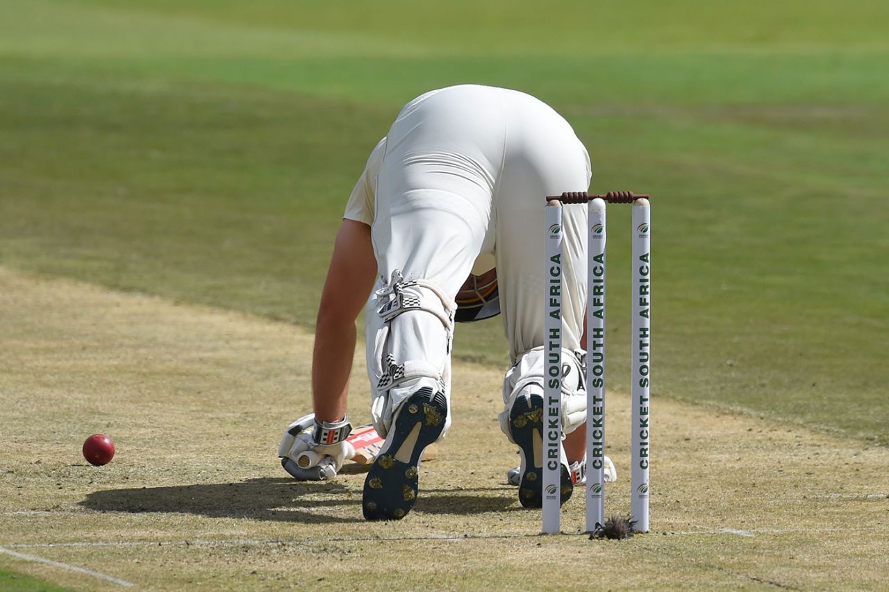 Dom Sibley peers between his legs to check if he has played on, South Africa v England, 4th Test, Day 1, Johannesburg, January 24, 2020