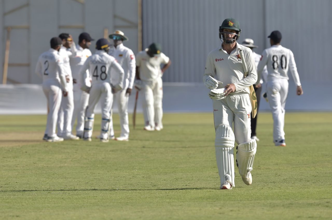 Sean Williams walks back after being dismissed by Dhananjaya de Silva, Zimbabwe v Sri Lanka, 2nd Test, Harare, 1st day, January 27, 2020
