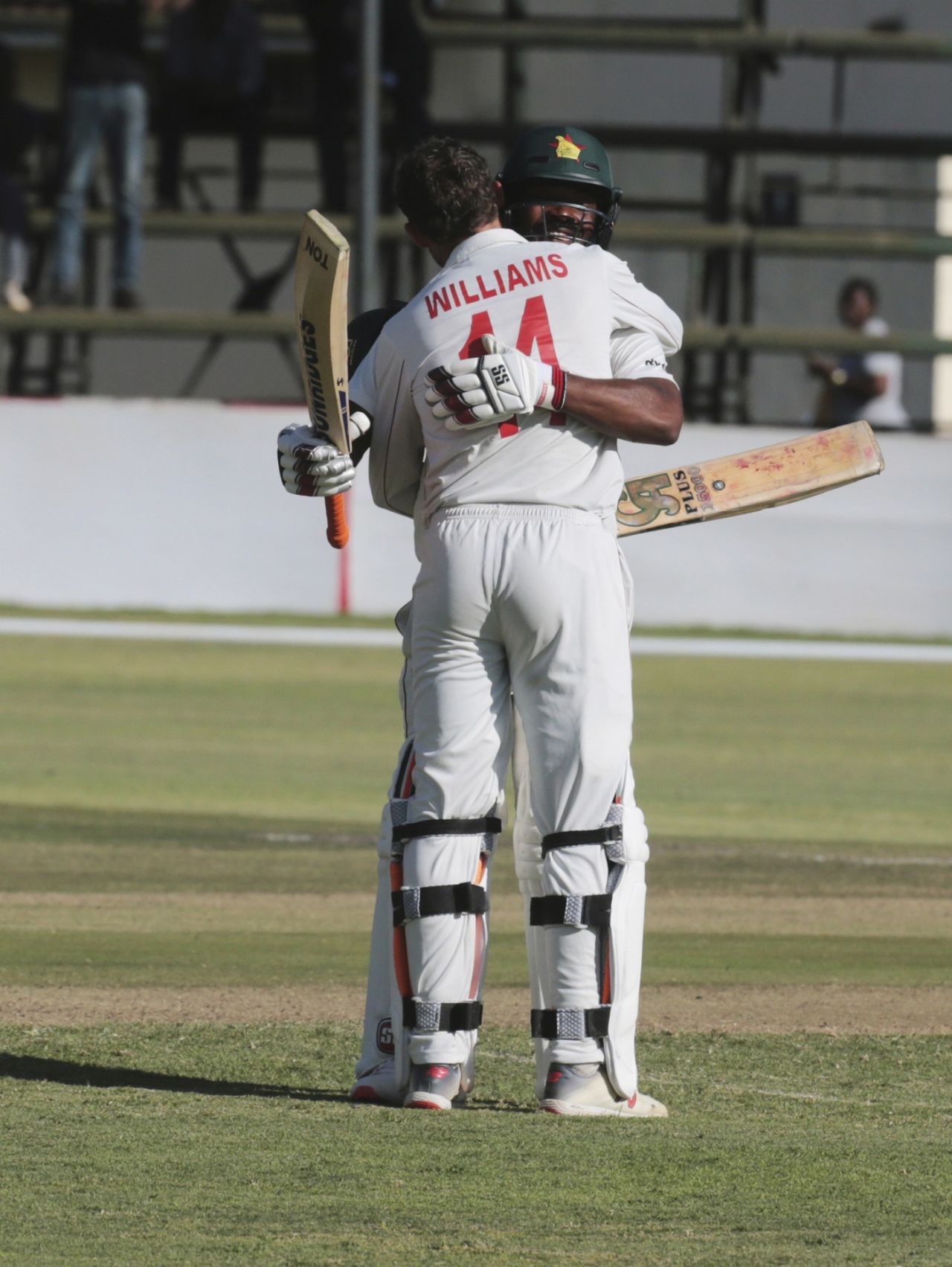 Sean Williams embraces Regis Chakabva upon reaching his century, Zimbabwe v Sri Lanka, 2nd Test, Harare, 1st day, January 27, 2020