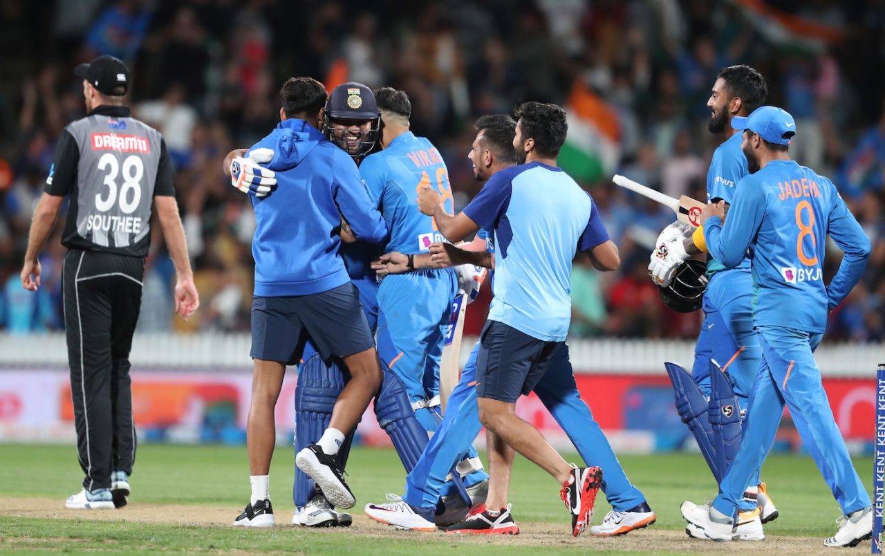 Rohit Sharma is mobbed after clinching the win, New Zealand v India, 3rd T20I, Hamilton, January 29, 2020