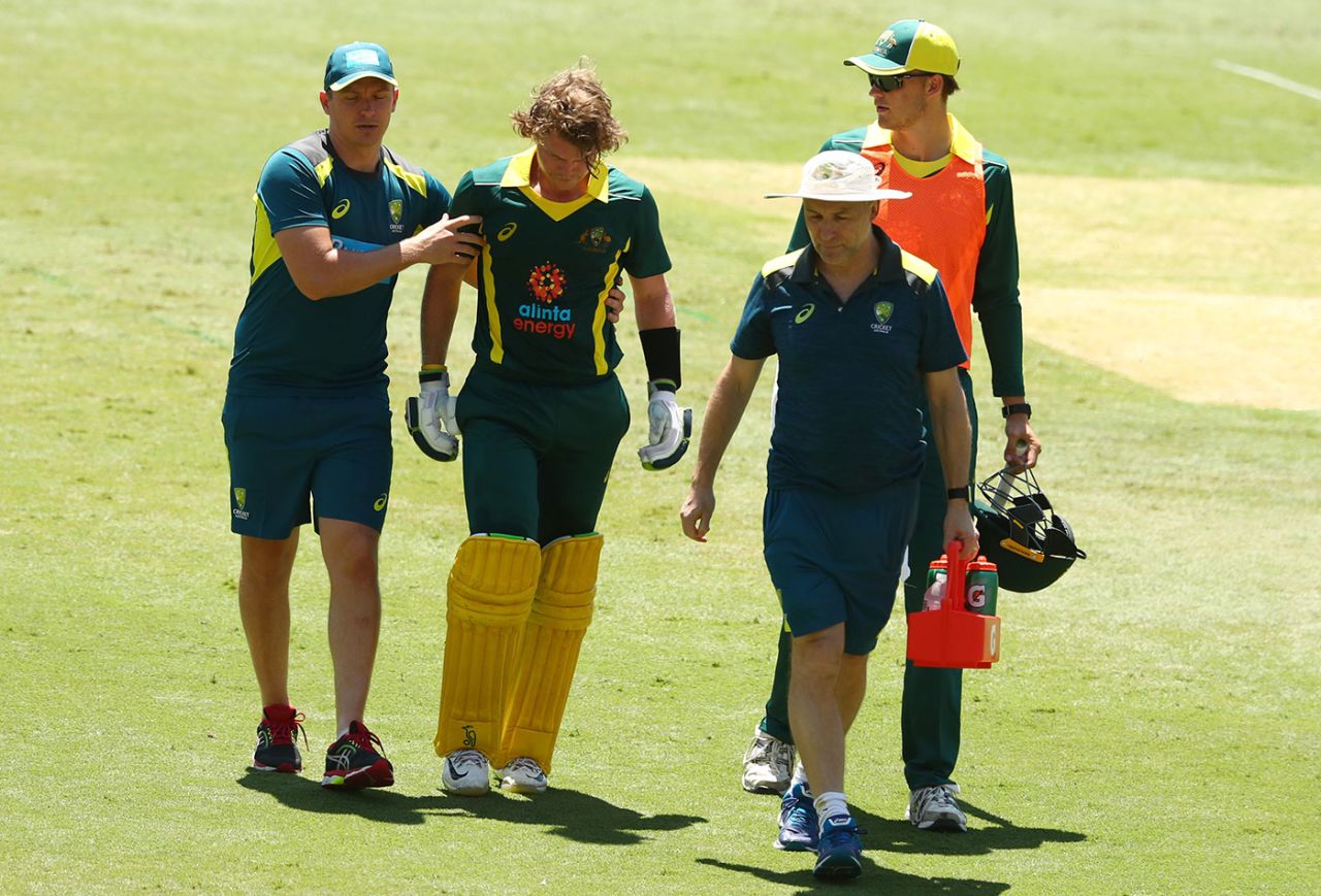 Will Pucovski is helped off the field after he stumbled taking a run, Cricket Australia XI v England Lions, Metricon Stadium, February 2, 2020