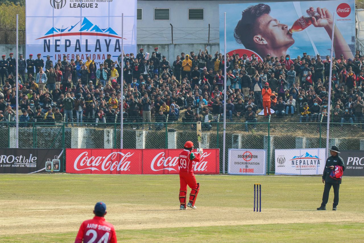 Oman's Mohammad Nadeem acknowledges applause from the Tribhuvan University Stadium crowd after reaching his fifty, Nepal v Oman, ICC Cricket World Cup League Two tri-series, Kirtipur, February 5, 2020
