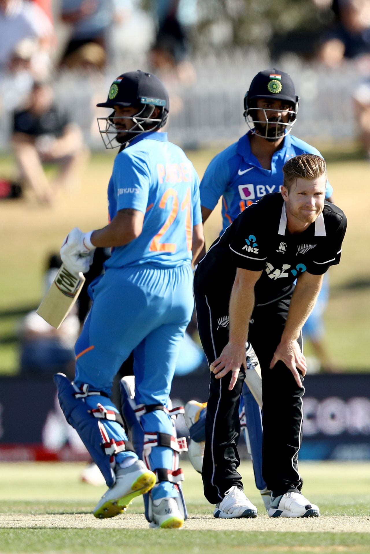 Jimmy Neesham looks on as KL Rahul and Manish Pandey pinch a run, New Zealand v India, 3rd ODI, Mount Maunganui, February 11, 2020