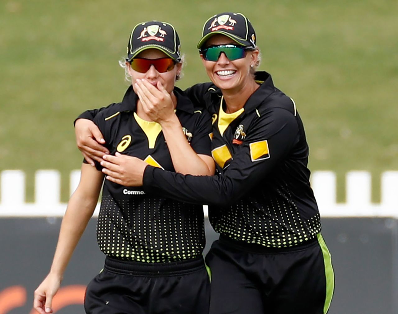 Nicola Carey (left) is congratulated on her catch to remove Smriti Mandhana, Australia v India, T20I tri-series, Junction Oval, February 