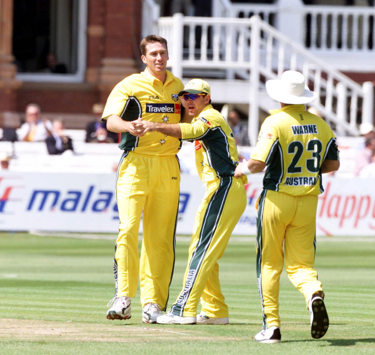Glenn McGrath celebrates with Ricky Ponting and Shane Warne after claiming the wicket of  Salim Elahi, final, Natwest ODI Triangular series, Lords, June 23, 2001