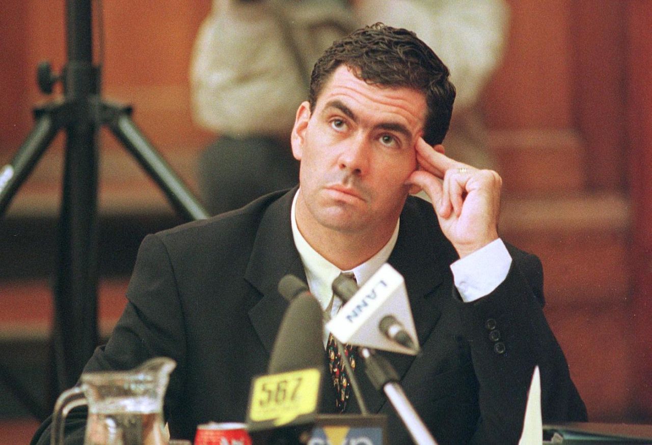 Hansie Cronje ponders a point during his cross-examination at the King Commission Inquiry into allegations of cricket match-fixing, Cape Town, June 22, 2000.