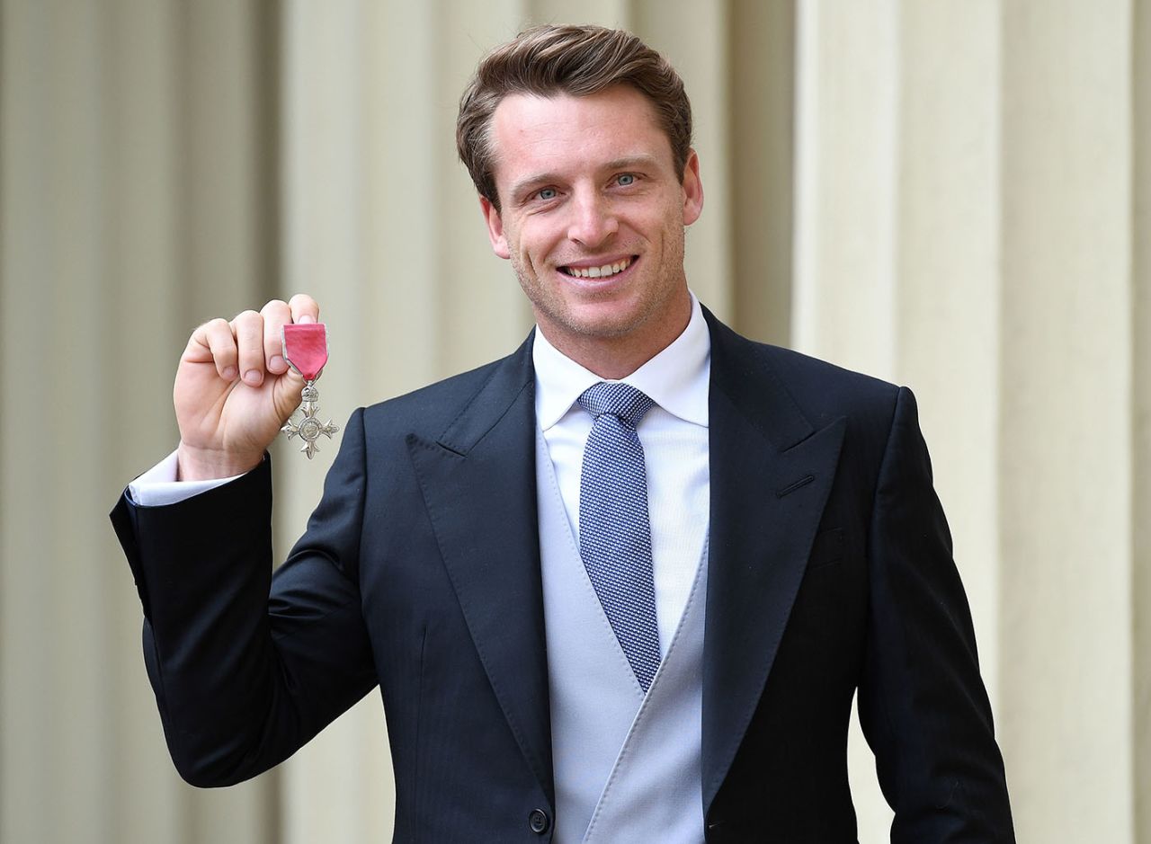 England cricketer Jos Buttler poses with his medal after being appointed a Member of the Order of the British Empire (MBE) following an investiture service at Buckingham Palace, London, February 25, 2020