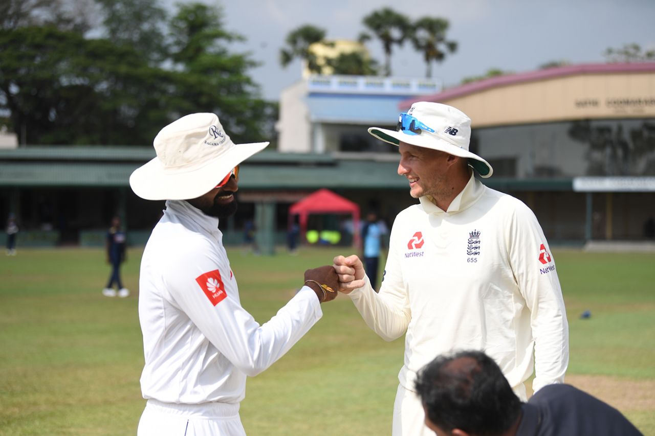 Captains Lahiru Thirimanne and Joe Root bump fists at the toss, SLC Board President's XI v England, Day 1, Colombo, March 12, 2020
