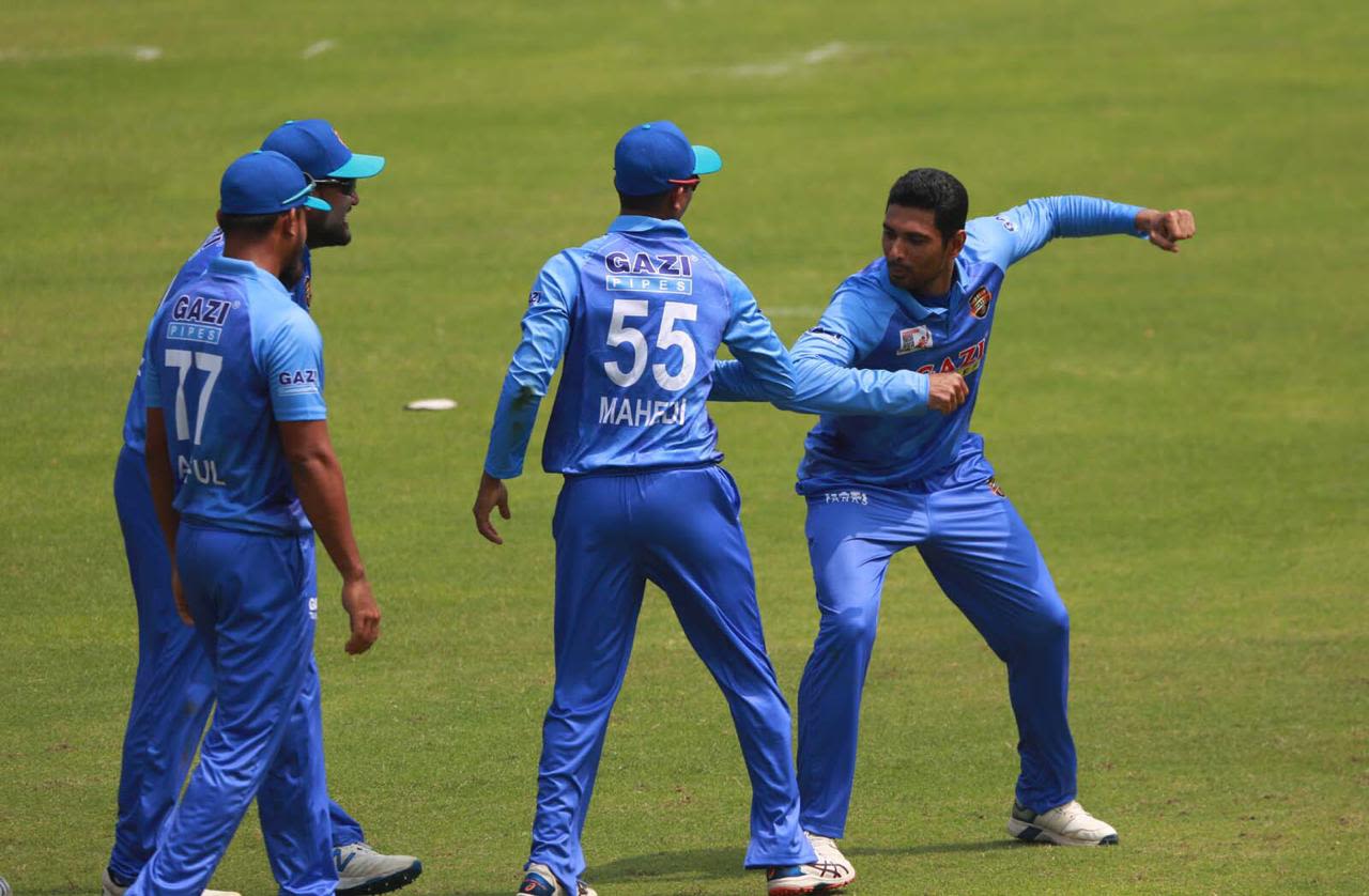 No handshakes - Mahmudullah does the elbow shake with a team-mate, Dhaka Premier Division Cricket League, Dhaka, March 16, 2020