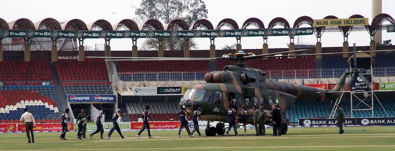 Members of the Sri Lankan international cricket team board a rescue helicopter at the Gadaffi Stadium, Lahore, Pakistan, March 3, 2009