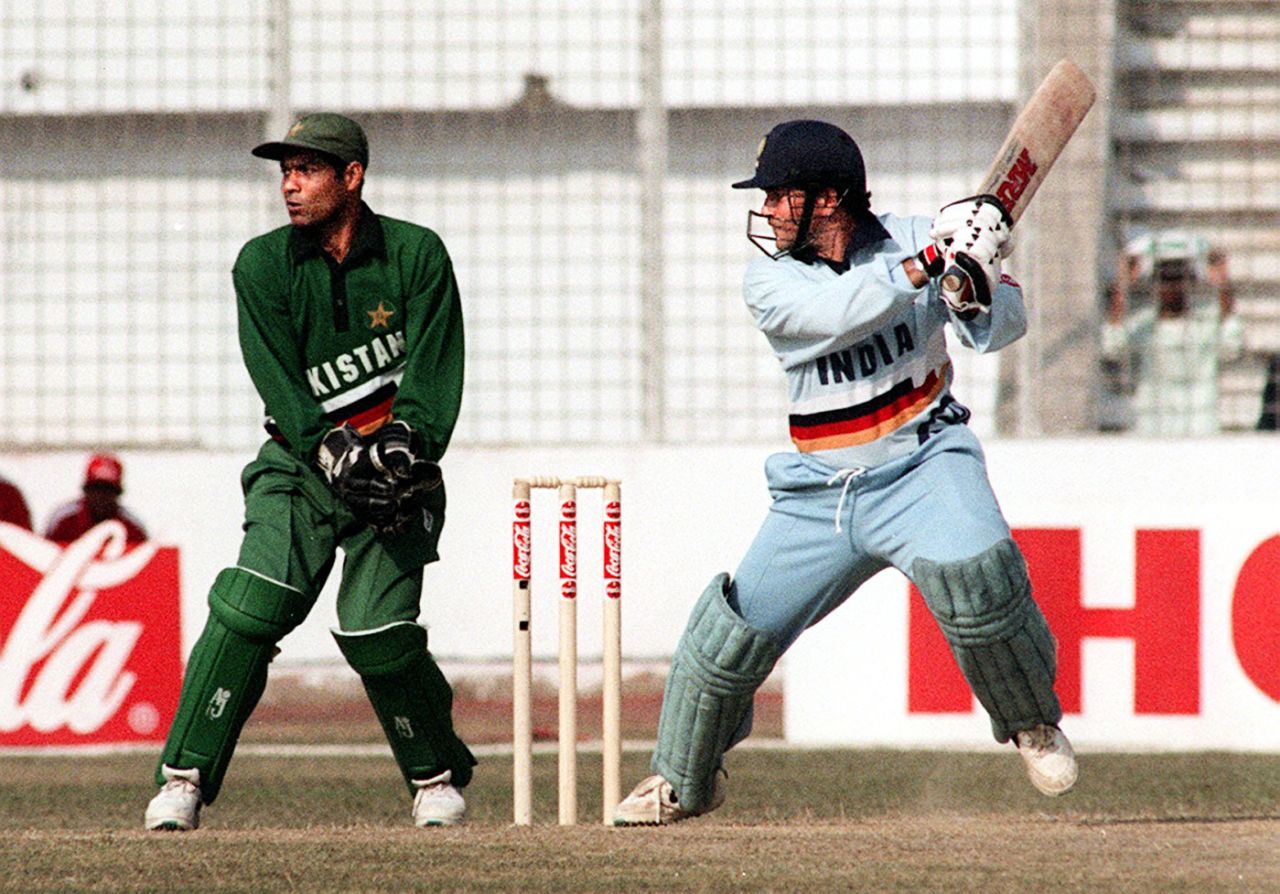 Wicketkeeper Rashid Latif watches Sachin Tendulkar cut his way to 95, India v Pakistan, Independence Cup, 1st ODI, January 14, 1998